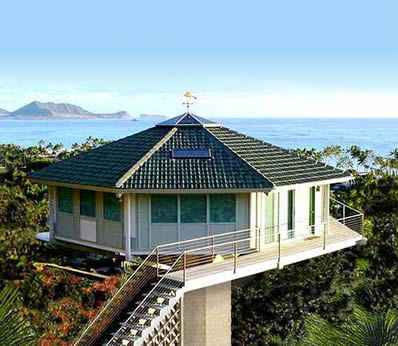 Hawaiian mountainside prefab pedestal home by Topsider Homes