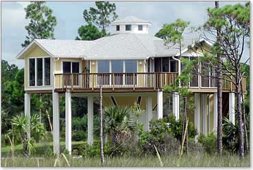 Hurricane proof elevated piling (stilt) home built 15-ft above the ground on the Gulf Coast of Florida by Topsider Homes